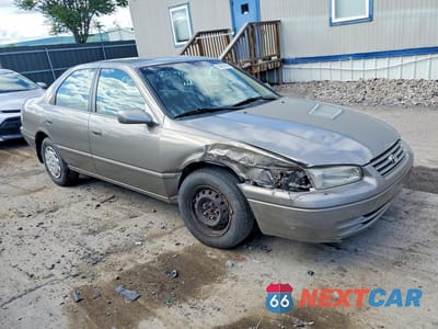 Czwarte zdjęcie samochodu z boku: 1999 TOYOTA CAMRY LE VIN:4T1BG22K2XU467434 - miniatura