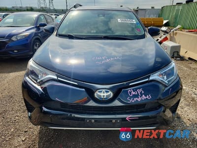 Piąte zdjęcie samochodu w środku: 2018 TOYOTA RAV4 HYBRID LE VIN:JTMRJREVXJD254340 - miniatura