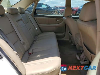 Zdjęcie 10 z 12 samochodu: 2003 TOYOTA AVALON XL VIN:4T1BF28B63U303236 - miniatura