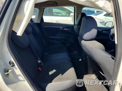 Zdjęcie 10 z 13 samochodu: 2017 HONDA FIT LX VIN:JHMGK5H54HS007070 - miniatura
