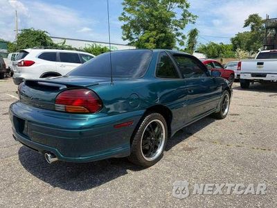 Trzecie zdjęcie samochodu z tyłu: 1996 PONTIAC GRAND AM GT VIN:1G2NW12M1TC832982 - miniatura