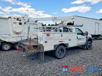 Trzecie zdjęcie samochodu z tyłu: 2009 FORD F450 SUPER DUTY BUCKET TRUCK VIN:1FDAF46Y29EA10631 - miniatura