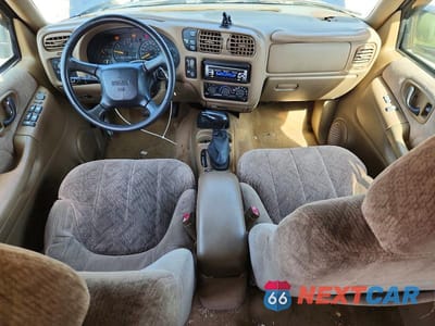 Zdjęcie 8 z 12 samochodu: 1999 GMC JIMMY VIN:1GKDT13W7X2524991 - miniatura
