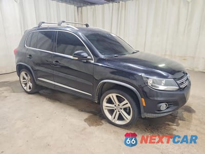 Czwarte zdjęcie samochodu z boku: 2016 VOLKSWAGEN TIGUAN S VIN:WVGAV7AX2GW067339 - miniatura
