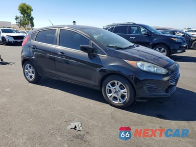 Czwarte zdjęcie samochodu z boku: 2014 FORD FIESTA SE VIN:3FADP4EJXEM107427 - miniatura