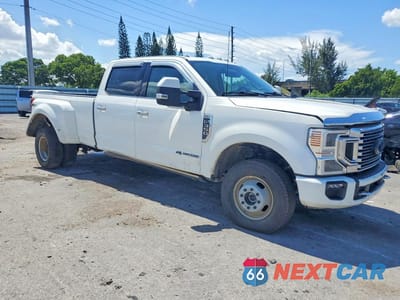 Czwarte zdjęcie samochodu z boku: 2022 FORD F350 SUPER DUTY VIN:1FT8W3DT3NEC06107 - miniatura