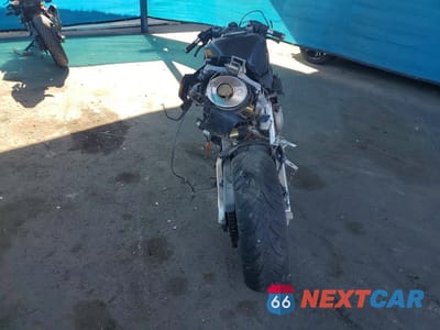 Czwarte zdjęcie samochodu z boku: 2006 HONDA CBR600 RR VIN:JH2PC37186M300125 - miniatura