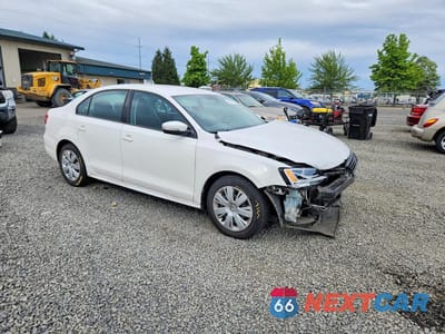 Czwarte zdjęcie samochodu z boku: 2011 VOLKSWAGEN JETTA SE VIN:3VWDZ7AJ8BM375154 - miniatura