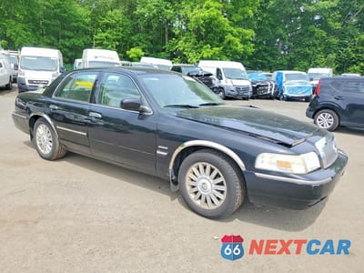Czwarte zdjęcie samochodu z boku: 2010 MERCURY GRAND MARQUIS LS VIN:2MEBM7FV3AX600196 - miniatura