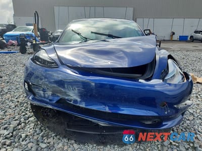 Piąte zdjęcie samochodu w środku: 2021 TESLA MODEL 3 VIN:5YJ3E1EB2MF032678 - miniatura