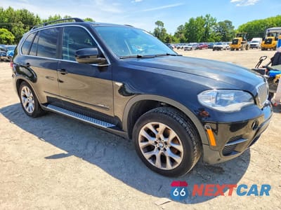 Czwarte zdjęcie samochodu z boku: 2013 BMW X5 XDRIVE35I VIN:5UXZV4C55D0B24005 - miniatura
