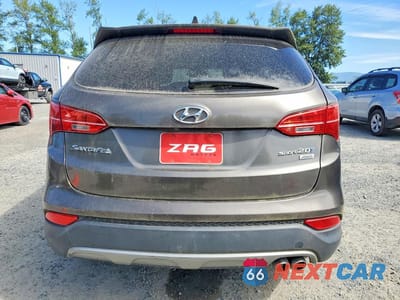 Zdjęcie 6 z 13 samochodu: 2013 HYUNDAI SANTA FE SPORT 2.0T VIN:5XYZWDLA8DG008252 - miniatura