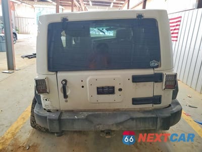 Zdjęcie 6 z 12 samochodu: 2012 JEEP WRANGLER UNLIMITED SAHARA VIN:1C4BJWEG9CL167474 - miniatura