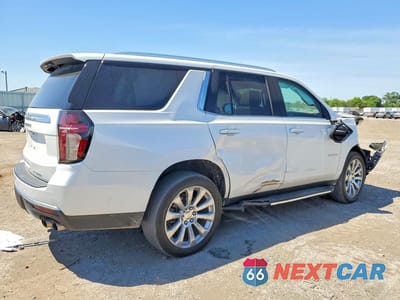 Trzecie zdjęcie samochodu z tyłu: 2021 CHEVROLET TAHOE K1500 PREMIER VIN:1GNSKSKDXMR140693 - miniatura