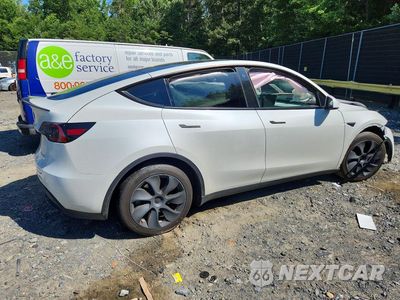 Trzecie zdjęcie samochodu z tyłu: 2023 TESLA MODEL Y VIN:7SAYGDEE6PF672573 - miniatura