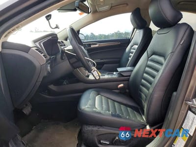 Zdjęcie 7 z 12 samochodu: 2019 FORD FUSION SEL VIN:3FA6P0MUXKR181796 - miniatura