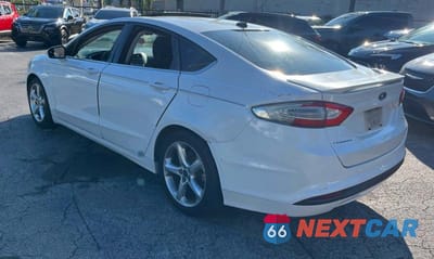 Trzecie zdjęcie samochodu z tyłu: 2015 FORD FUSION SE VIN:3FA6P0H74FR261623 - miniatura