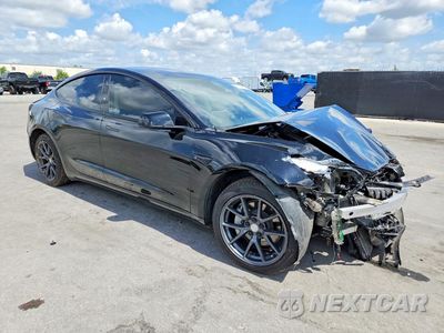 Czwarte zdjęcie samochodu z boku: 2023 TESLA MODEL 3 VIN:5YJ3E1EA2PF626506 - miniatura