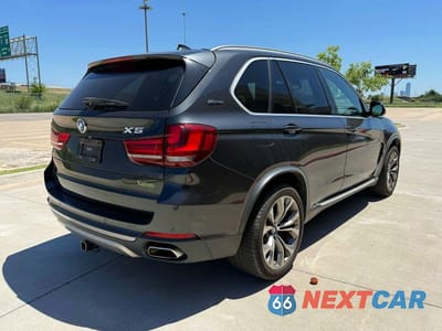Czwarte zdjęcie samochodu z boku: 2018 BMW X5 XDR40E VIN:5UXKT0C54J0W02939 - miniatura
