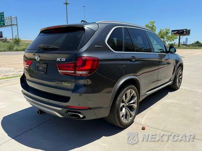 Czwarte zdjęcie samochodu z boku: 2018 BMW X5 XDR40E VIN:5UXKT0C54J0W02939 - miniatura