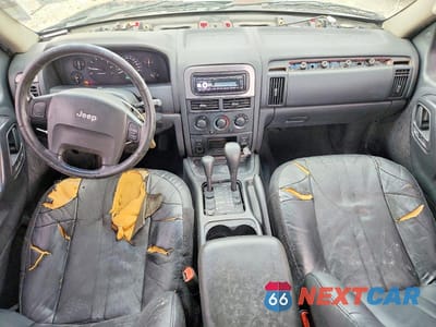 Zdjęcie 8 z 14 samochodu: 2003 JEEP GRAND CHEROKEE LAREDO VIN:1J4GW48S83C608856 - miniatura