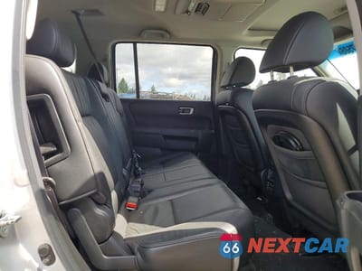 Zdjęcie 11 z 13 samochodu: 2011 HONDA PILOT EXL VIN:5FNYF4H61BB002068 - miniatura