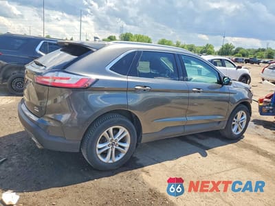 Trzecie zdjęcie samochodu z tyłu: 2019 FORD EDGE SEL VIN:2FMPK3J90KBB36021 - miniatura