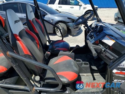 Piąte zdjęcie samochodu w środku: 2012 POLARIS RZR UTILITY VEHICLE VIN:4XAXE7EA9CF660024 - miniatura