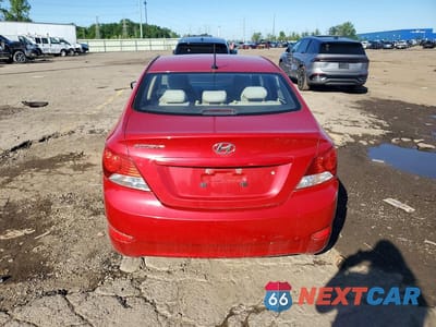 Zdjęcie 6 z 12 samochodu: 2014 HYUNDAI ACCENT GLS VIN:KMHCT4AEXEU777223 - miniatura
