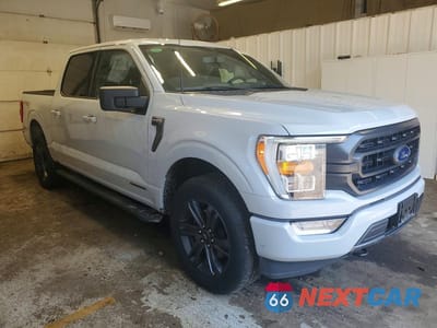 Czwarte zdjęcie samochodu z boku: 2023 FORD F150 SUPERCREW VIN:1FTFW1ED2PFC74916 - miniatura