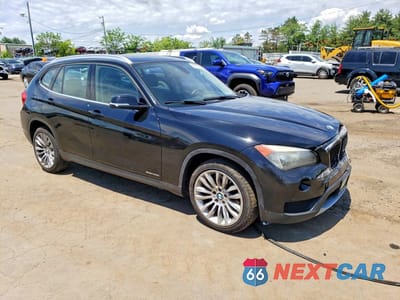 Czwarte zdjęcie samochodu z boku: 2014 BMW X1 XDRIVE28I VIN:WBAVL1C56EVR93781 - miniatura