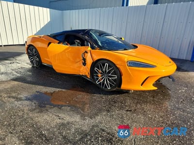 Czwarte zdjęcie samochodu z boku: 2023 MCLAREN AUTOMOTIVE GT VIN:SBM22GCA2PW002850 - miniatura
