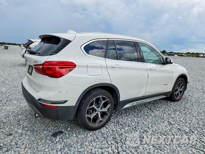 Trzecie zdjęcie samochodu z tyłu: 2018 BMW X1 XDRIVE28I VIN:WBXHT3C32J5K31622 - miniatura