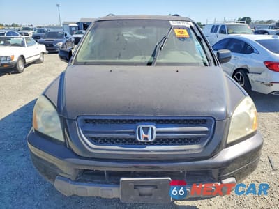 Piąte zdjęcie samochodu w środku: 2004 HONDA PILOT EXL VIN:2HKYF18504H611758 - miniatura