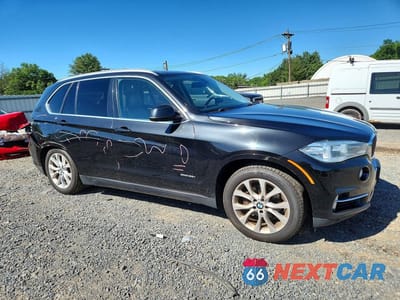 Czwarte zdjęcie samochodu z boku: 2014 BMW X5 XDRIVE35I VIN:5UXKR0C5XE0H25541 - miniatura