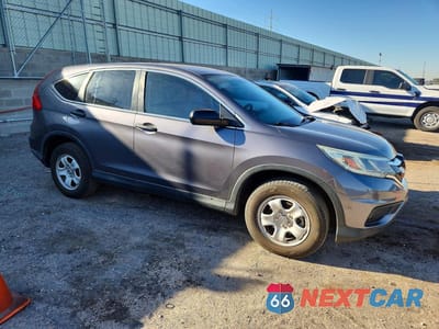 Czwarte zdjęcie samochodu z boku: 2015 HONDA CR-V LX VIN:2HKRM3H33FH510317 - miniatura