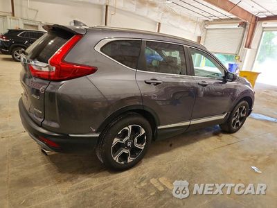 Trzecie zdjęcie samochodu z tyłu: 2018 HONDA CR-V TOURING VIN:5J6RW2H96JL031610 - miniatura