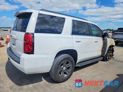 Trzecie zdjęcie samochodu z tyłu: 2019 CHEVROLET TAHOE C1500 LS VIN:1GNSCAKC0KR237509 - miniatura
