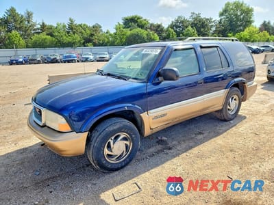 1999 GMC JIMMY 1GKDT13W7X2524991 - główne zdjęcie licytacji z USA - miniatura