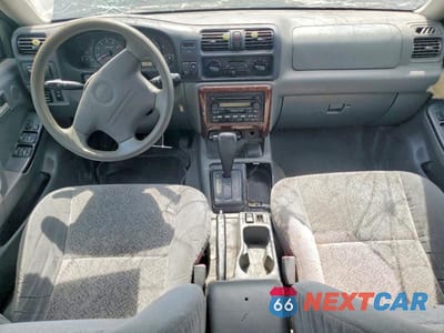Zdjęcie 8 z 14 samochodu: 2002 ISUZU RODEO S VIN:4S2CK58W924333410 - miniatura