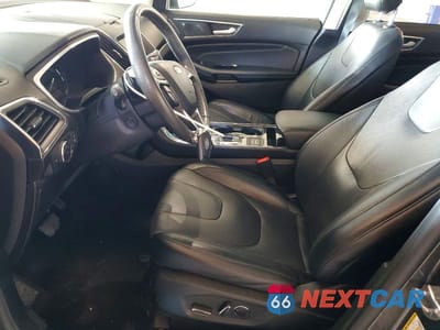 Zdjęcie 7 z 13 samochodu: 2019 FORD EDGE TITANIUM VIN:2FMPK4K90KBC02023 - miniatura