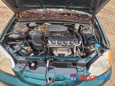 Zdjęcie 11 z 12 samochodu: 2001 HONDA CIVIC LX VIN:1HGEM22561L042088 - miniatura