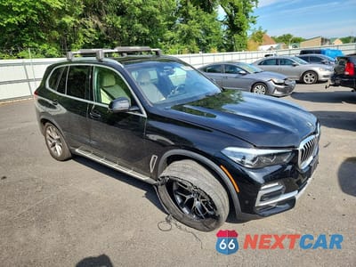 Czwarte zdjęcie samochodu z boku: 2021 BMW X5 XDRIVE40I VIN:5UXCR6C03M9E57406 - miniatura
