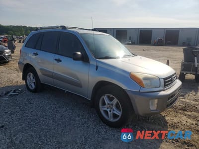 Czwarte zdjęcie samochodu z boku: 2003 TOYOTA RAV4 BASE VIN:JTEGH20VX30090787 - miniatura