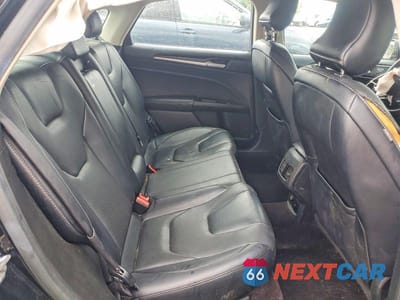 Zdjęcie 10 z 13 samochodu: 2017 FORD FUSION TITANIUM PHEV VIN:3FA6P0SU3HR151972 - miniatura
