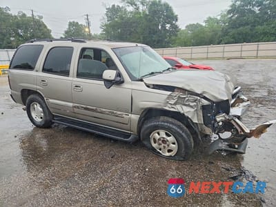 Czwarte zdjęcie samochodu z boku: 2002 GMC YUKON VIN:1GKEC13Z12J235540 - miniatura