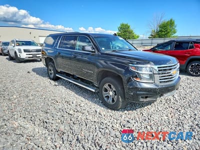 Czwarte zdjęcie samochodu z boku: 2015 CHEVROLET SUBURBAN K1500 LT VIN:1GNSKJKC0FR737727 - miniatura
