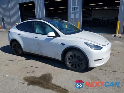 Czwarte zdjęcie samochodu z boku: 2021 TESLA MODEL Y VIN:5YJYGDEE2MF224467 - miniatura