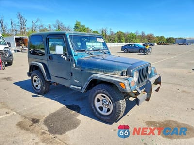 Czwarte zdjęcie samochodu z boku: 1997 JEEP WRANGLER / TJ SE VIN:1J4FY29PXVP511559 - miniatura