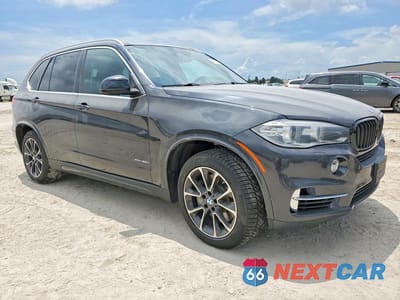 Czwarte zdjęcie samochodu z boku: 2015 BMW X5 XDRIVE50I VIN:5UXKR6C55F0J75411 - miniatura